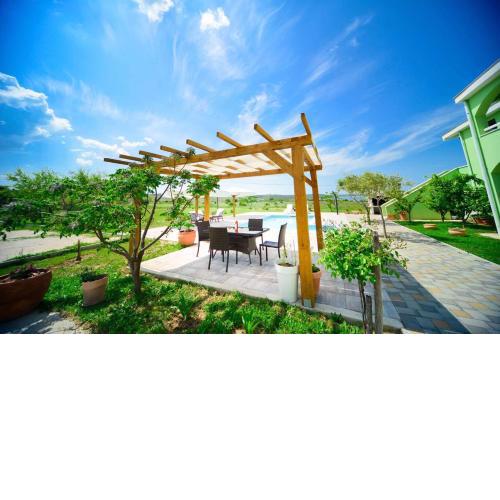 3 bedrooms appartement at Ljubac 300 m away from the beach with sea view shared pool and furnished garden