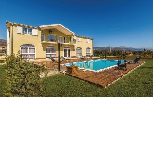 Amazing home in Divulje with WiFi and 8 Bedrooms