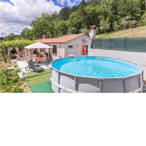 Amazing home in Kostrcani with 2 Bedrooms and WiFi
