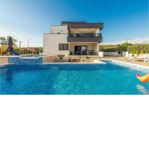 Amazing Home In Posedarje With 5 Bedrooms, Wifi And Outdoor Swimming Pool