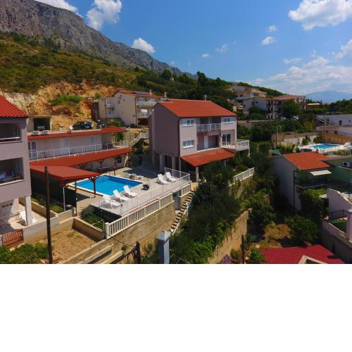 Apartments and rooms with a swimming pool Lokva Rogoznica, Omis - 18328