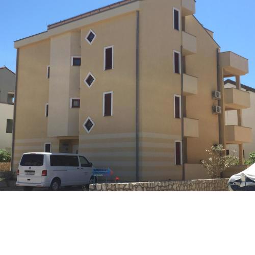 Apartments with a parking space Novalja, Pag - 17110
