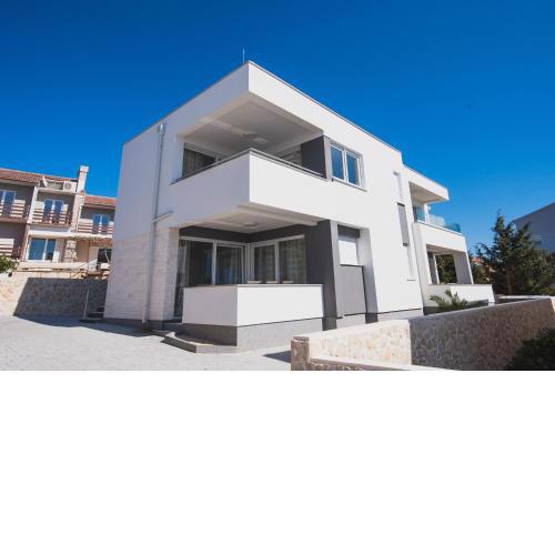 Apartments with a parking space Novalja, Pag - 17215