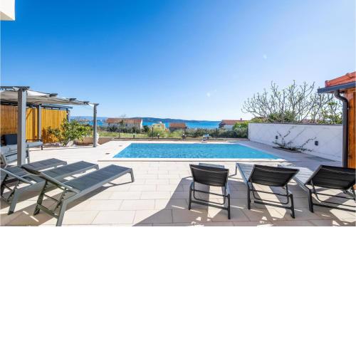Awesome apartment in Kastel Gomilica with Outdoor swimming pool, WiFi and 2 Bedrooms