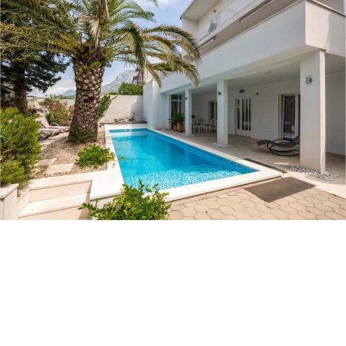 Awesome Apartment In Makarska With Wifi, Outdoor Swimming Pool And Heated Swimming Pool