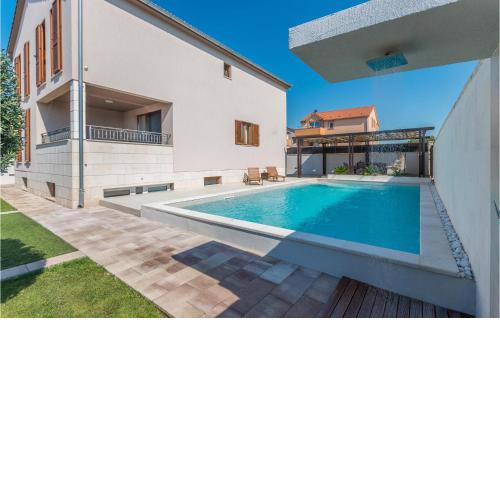 Awesome Home In Biograd Na Moru With 4 Bedrooms, Sauna And Outdoor Swimming Pool