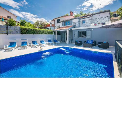 Awesome Home In Dobrinj With 4 Bedrooms, Outdoor Swimming Pool And Heated Swimming Pool