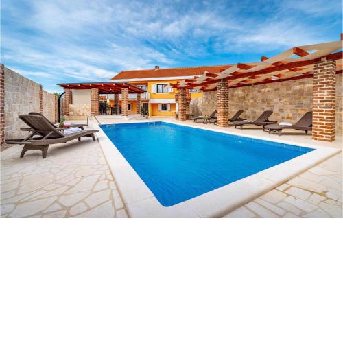 Awesome home in Pridraga with Outdoor swimming pool, WiFi and 3 Bedrooms