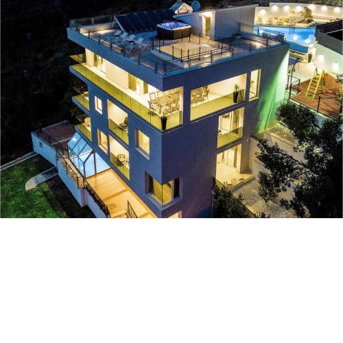 Awesome home in Zrnovnica with 8 Bedrooms, Outdoor swimming pool and Heated swimming pool