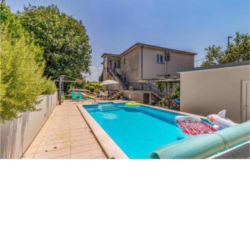 Beautiful apartment in Kostrena with 2 Bedrooms, WiFi and Outdoor swimming pool