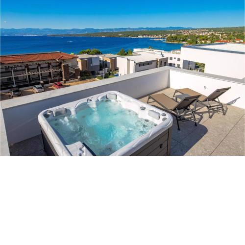 Beautiful apartment in Malinska with Jacuzzi, WiFi and 3 Bedrooms