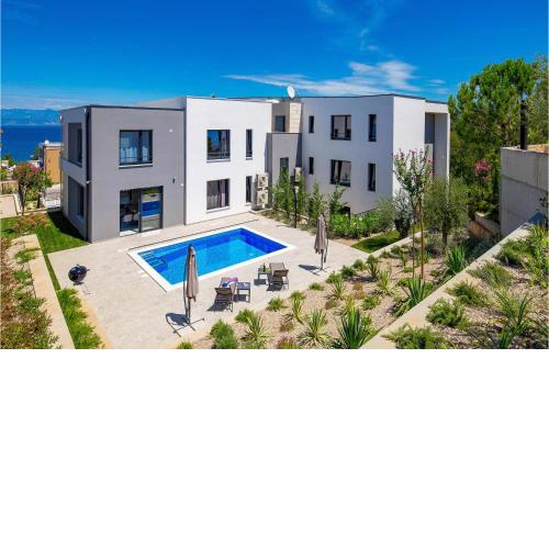 Beautiful apartment in Malinska with Outdoor swimming pool, WiFi and 2 Bedrooms