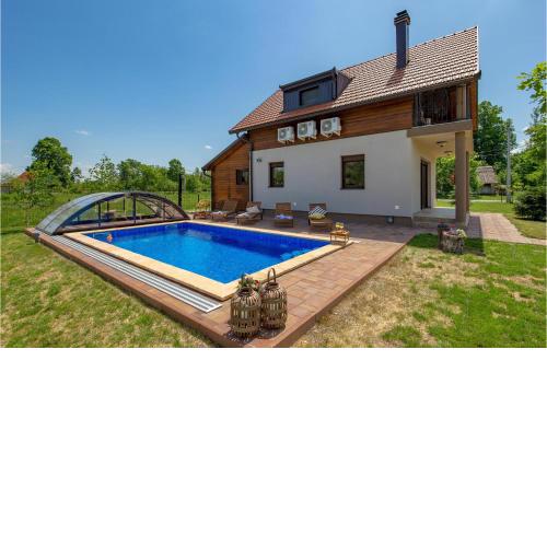 Beautiful home in Gospic with Outdoor swimming pool, WiFi and 2 Bedrooms