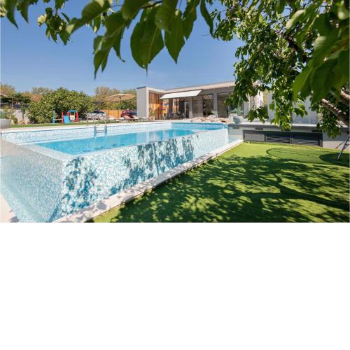 Beautiful home in Katuni w/ Outdoor swimming pool and 3 Bedrooms