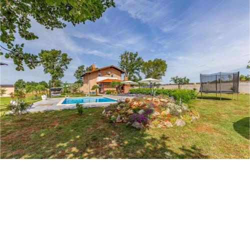 Beautiful home in Marcana with 4 Bedrooms, WiFi and Outdoor swimming pool