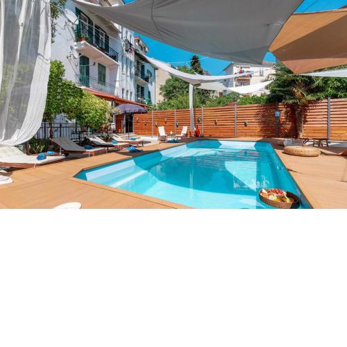 Evala luxury rooms with pool and garden