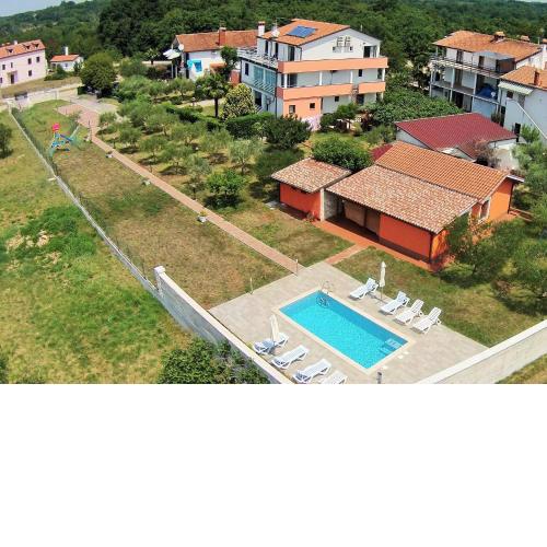 Family friendly apartments with a swimming pool Babici, Umag - 2531