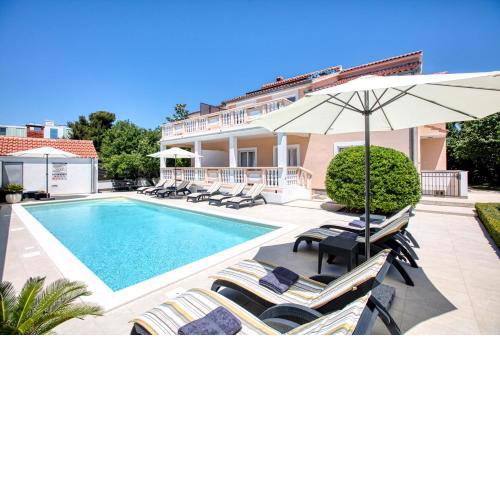 Family friendly apartments with a swimming pool Biograd na Moru, Biograd - 19356