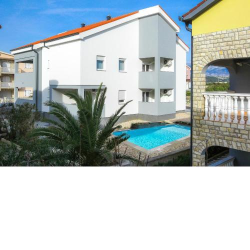 Family friendly apartments with a swimming pool Novalja, Pag - 17228