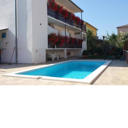 Family friendly apartments with a swimming pool Pula - 7610