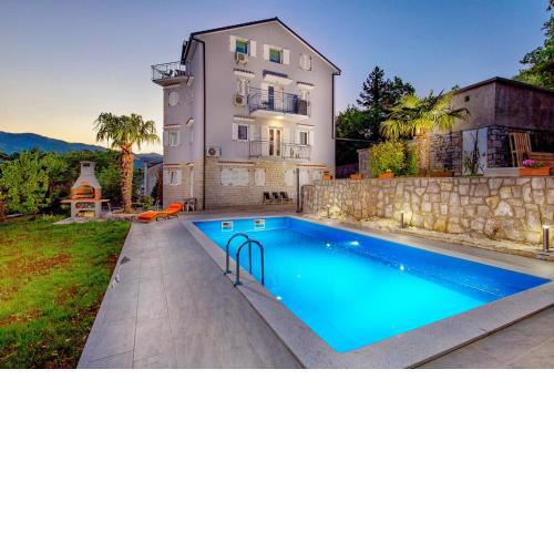 Family friendly apartments with a swimming pool Rijeka - 14294