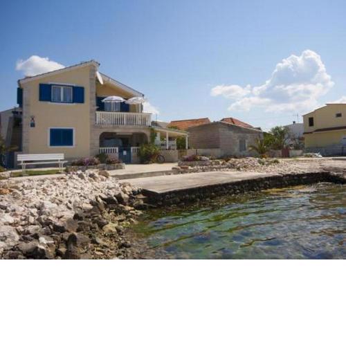 Family friendly seaside apartments Krapanj, Sibenik - 18004