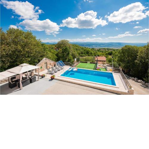 Four-Bedroom Holiday Home in Lokvicici