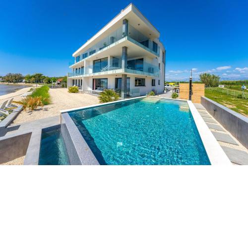 Jimmys Beach Familientraum direkt am Meer mit Pool