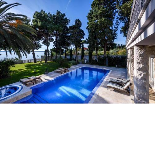 Luxury Seafront Villa Castello Split with private heated pool, jacuzzi and sauna at the beach in Split