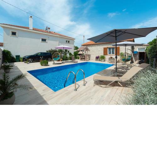 NEW! Beachfront Holiday home Delight with private pool