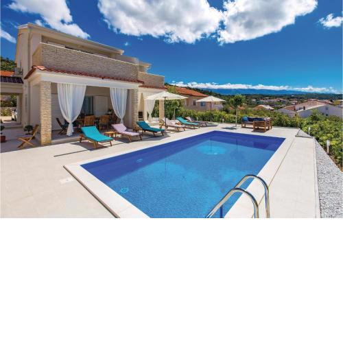 Nice apartment in Barbat with 3 Bedrooms, WiFi and Outdoor swimming pool