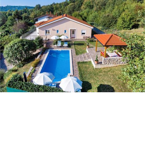 Nice home in Kastav with 4 Bedrooms, WiFi and Outdoor swimming pool