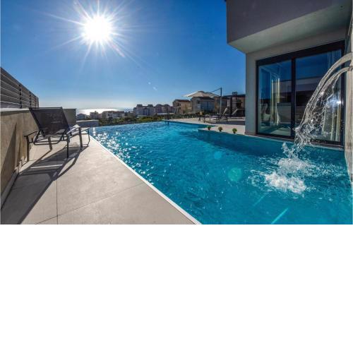Nice home in Novalja with WiFi, 4 Bedrooms and Outdoor swimming pool