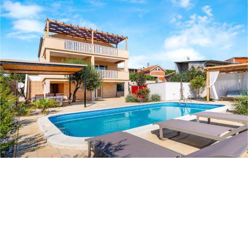 Nice home in Posedarje with 4 Bedrooms, WiFi and Outdoor swimming pool