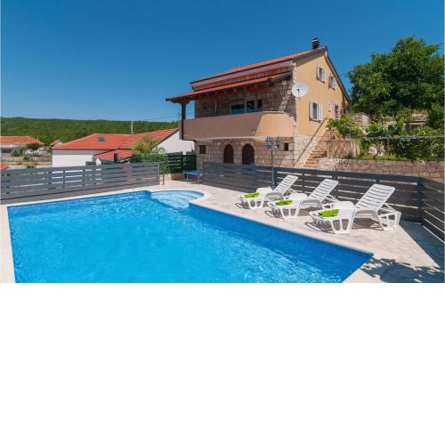 Nice home in Slivno with Outdoor swimming pool and 4 Bedrooms