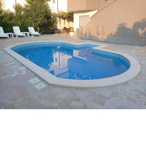 No stress studio apartman sa bazenom
