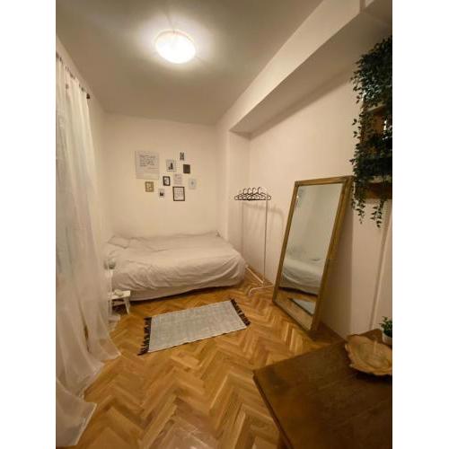 Room with shared bathroom