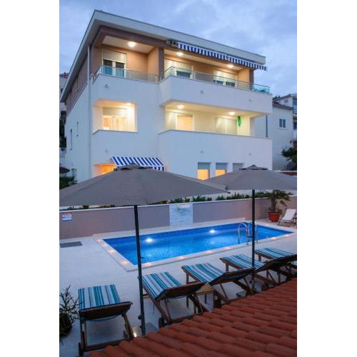 Seaside apartments with a swimming pool Rastici, Ciovo - 11092
