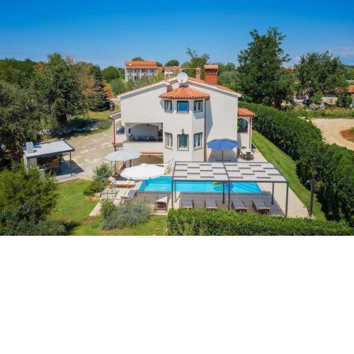 Villa Eufemia with large garden and outdoor playground for kids