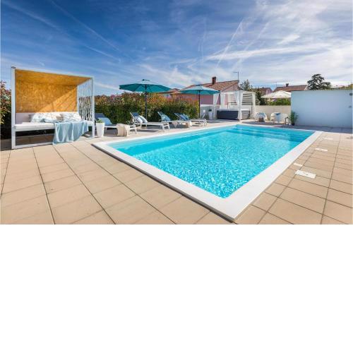 Awesome home in Pula with 3 Bedrooms, WiFi and Outdoor swimming pool