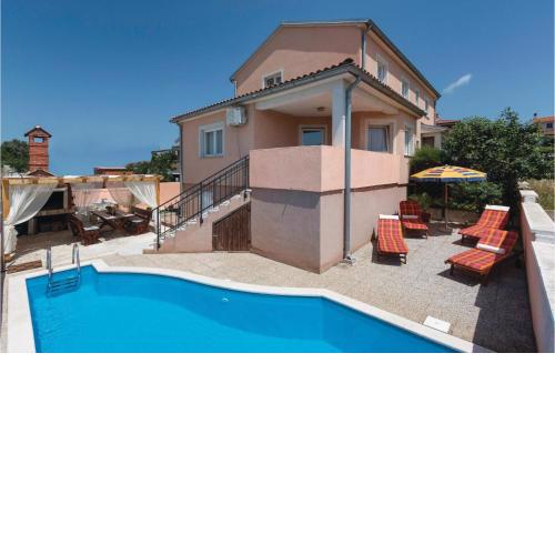 Awesome home in Pula with 4 Bedrooms, WiFi and Outdoor swimming pool